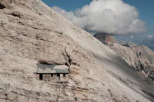 Mystery of 'world's loneliest house' that's stuck on side of remote mountain range - Daily Star