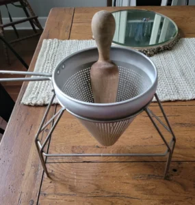 The aluminum strainer cone