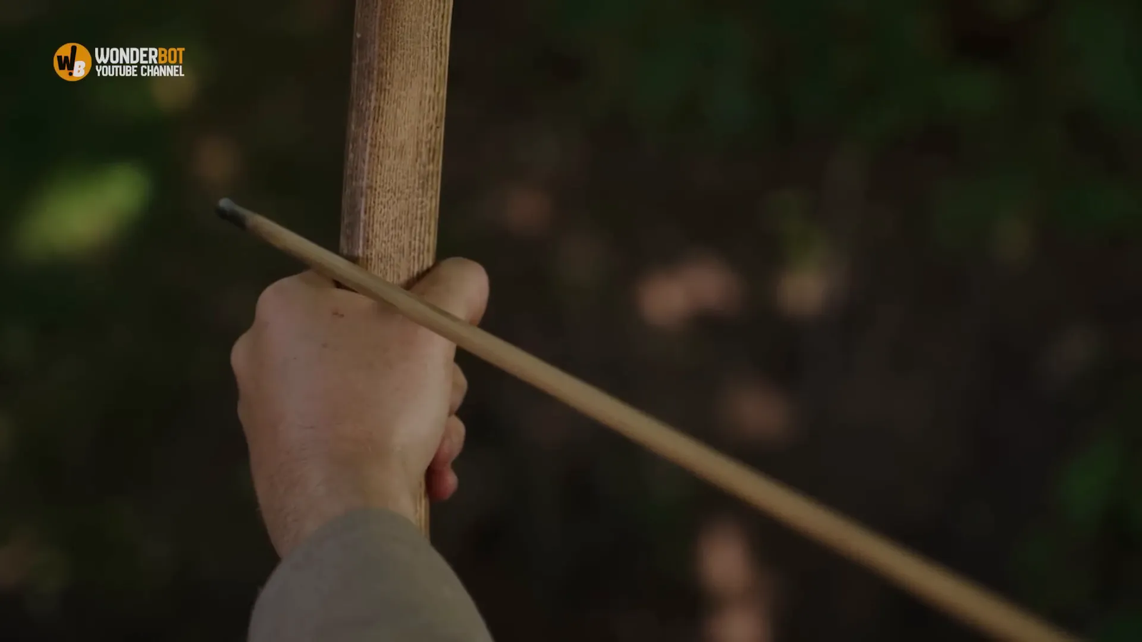 Elias confronted by the stranger with an arrow